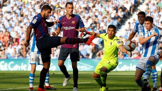 Barcelona melanjutkan start sempurnanya di Liga Spanyol dengan mengalahkan Real Sociedad