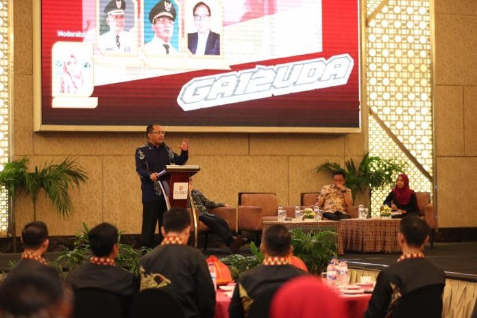 Silaturahmi Nasional (Silatnas) dan Temu Alumni Purna Praja Angkatan 12 Sekolah Tinggi Pemerintahan Dalam Negeri (STPDN), di Hotel Grand Claro, pada Sabtu (16/2/2019).