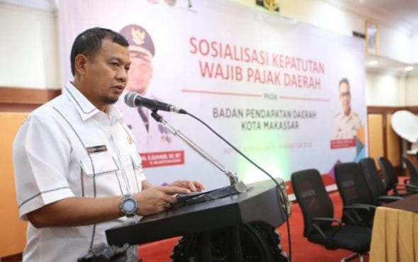 Sosialisasi Kepatuhan Pajak Daerah yang diadakan di hotel Singgasana