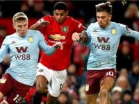 Matt Targett (kiri) mengawal Marcus Rashford pada pertandingan Manchester United vs Aston Villa. (c) AP Photo