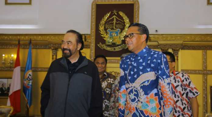 Surya Paloh bersama Gubernur Sulsel Prof Nurdin Abdullah.
