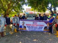 Cegah Covid-19, Kader NasDem Jeneponto Gelar Penyemprotan Disinfektan