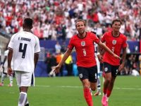 Harry Kane (nomor 9). (AFP)