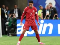 Ronaldo melakukan selebrasi setelah membobol gawang Uzbekistan pada Rabu (24/6/2026). (AFP)