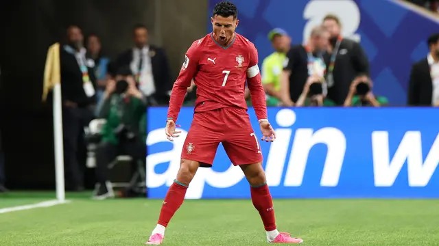 Ronaldo melakukan selebrasi setelah membobol gawang Uzbekistan pada Rabu (24/6/2026). (AFP)