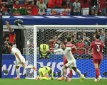 Pemain Spanyol merayakan gol Mikel Merino ke gawang Portugal di babak 16 besar Piala Dunia 2026 di Stadion Dallas, Texas, Amerika Serikat, Selasa (7/7/2026). (AFP)